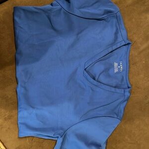 JAANUU-medium royal blue scrub top only. Stretch fabric.